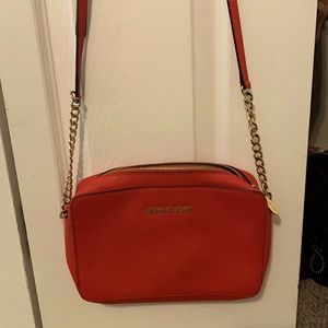 Brand new never used red crossbody bag.